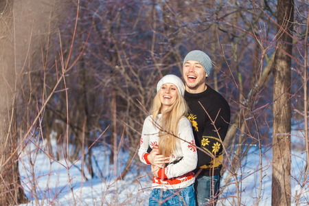 love story man and woman walking in the parkの写真素材