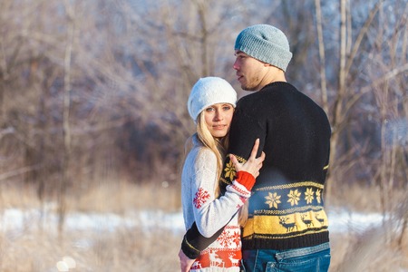 love story man and woman walking in the parkの写真素材