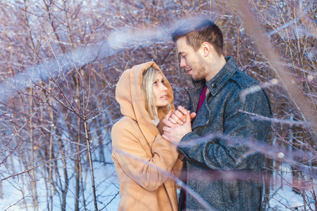 love story man and woman walking in the parkの写真素材