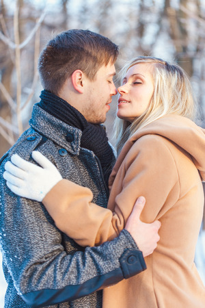 love story man and woman walking in the parkの写真素材