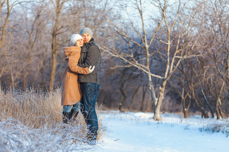 love story man and woman walking in the parkの写真素材