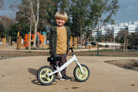 Little toddler boy riding on his bicycleの写真素材