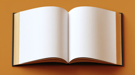 An open book with blank pages resting on a vibrant orange background. This image invites creativity and inspiration for writers, educators, and designers alike.の素材