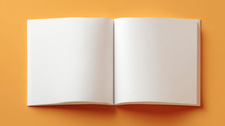 A blank open book positioned on a vibrant orange background, perfect for showcasing creativity, design projects, and minimalist presentations with an inviting aesthetic.の素材