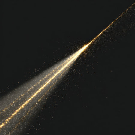 A striking light beam with sparkles radiates against a dark backdrop, creating a mystical ambiance perfect for abstract art, creative projects, or visual storytelling.の素材