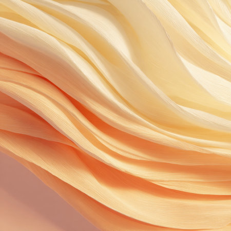 A captivating view of soft, sheer fabric flowing in gentle waves, featuring warm peach and cream tones that enhance any artistic or decorative concept effortlessly.の素材