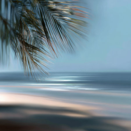 Discover a tranquil coastal scene featuring gentle waves lapping at the shore, palm leaves framing the serene view under a clear blue sky, perfect for relaxation and meditation.の素材