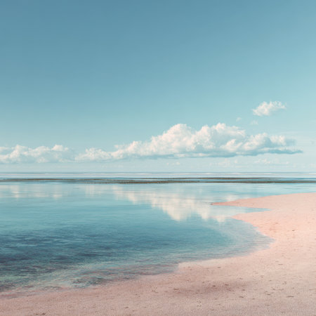 Tranquil coastal scenery at dawn with calm waters and soft clouds, creating a picturesque and serene environment perfect for travel and nature themes.の素材