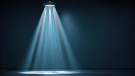 A captivating scene showcasing bright spotlights casting beams in a dark, empty space, perfect for setting a dramatic tone for both performances and events.の素材