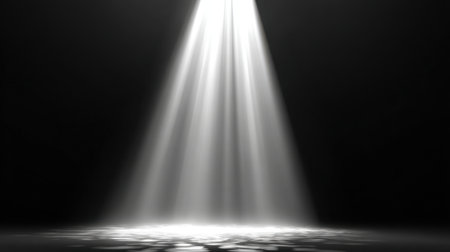 A stunning light beam cutting through the dark, casting gentle reflections on a smooth surface, creating an ethereal and mystical atmosphere perfect for artistic projects.の素材