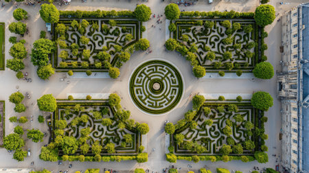Stunning aerial view of a beautifully designed garden featuring intricate pathways, lush greenery, and symmetrical patterns ideal for recreation and relaxation.の素材
