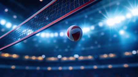 Captivating moment of a volleyball in motion approaching the net, showcasing the vibrant atmosphere of an exciting indoor sports event with dynamic lighting.の素材