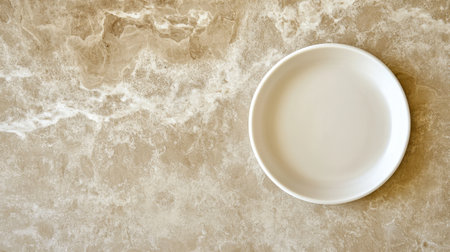 Clean and minimalist style featuring a white plate on a beige marble surface, perfect for showcasing food, culinary art, or restaurant menus in photography and design projects.の素材