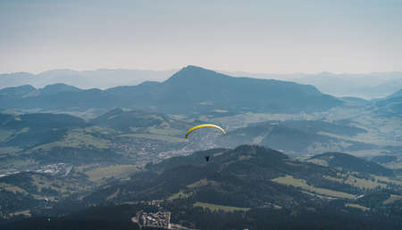 Paraglider with amazing mountain viewの写真素材