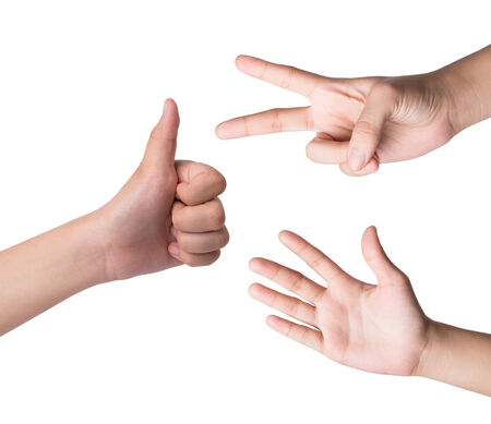 Female hand  isolated on white , roshambo signの写真素材