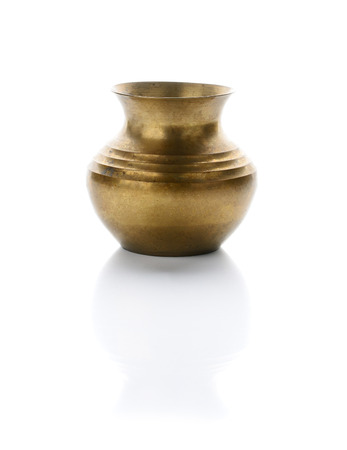 brass pot on white backgroundの写真素材