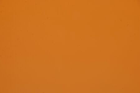 Orange texture colorful wall backgroundの写真素材