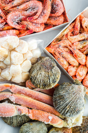 frozen shrimp in a box for sale on the marketの写真素材