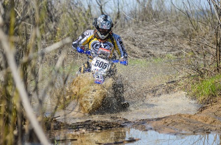 Khabarovsk , Russia - may 10, 2015 : Enduro motorcycle rides through the mud with a big splash at Khabarovsk rally - 2015のeditorial素材