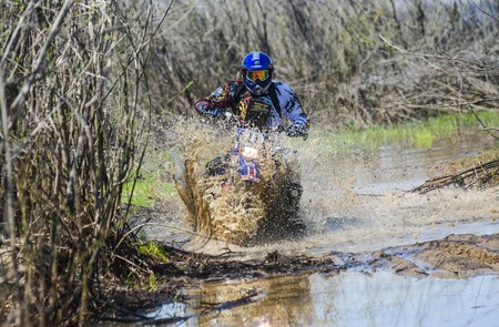 Khabarovsk , Russia - may 10, 2015 : Enduro motorcycle rides through the mud with a big splash at Khabarovsk rally - 2015のeditorial素材