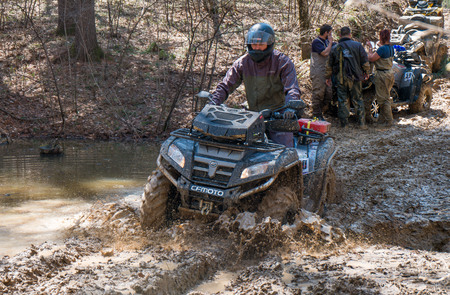 Khabarovsk , Russia - may 10, 2015 : ATV rides through the mud with a big splash at Khabarovsk rally - 2015のeditorial素材