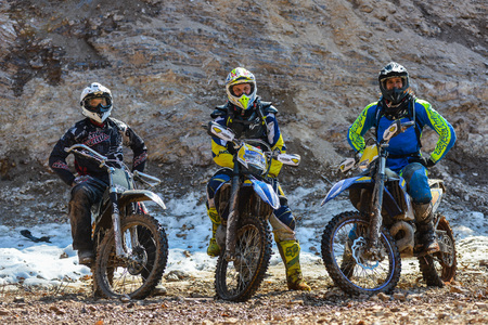 Khabarovsk , Russia - may 10, 2015 : Enduro motorcycles are riding on rastasia ice on the riverのeditorial素材