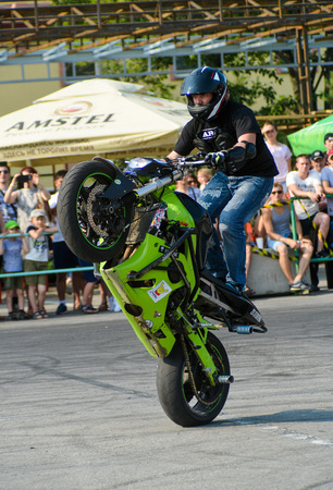 Khabarovsk Russia - July 11, 2015 : a  stunt rider on a sport bike ,on a stunt battle,  July 11, 2015 in Khabarovsk Russiaのeditorial素材