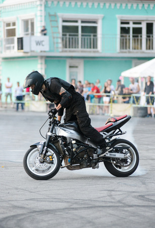 Khabarovsk Russia - July 11, 2015 : a  stunt rider on a sport bike ,on a stunt battle,  July 11, 2015 in Khabarovsk Russiaのeditorial素材