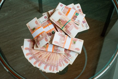 Money of the Russian Federation a lot of banknotes for five thousand rubles in a package