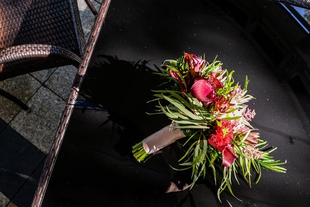Bridal bouquet with different flowers, honeymoon , redの写真素材