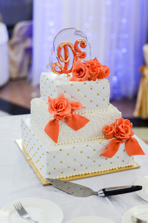 Wedding cake with red roses wedding cakeの写真素材