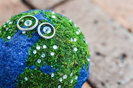 wedding rings in a basket for ringsの写真素材