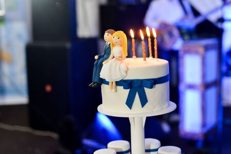 Wedding cake with red roses wedding cakeの写真素材