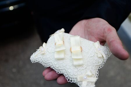 wedding rings in a basket for rings