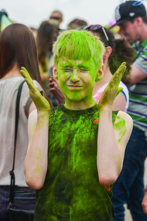 Khabarovsk, Russia - June 25, 2016: Tourist with students celebrating Holi on 25 July 2016 in Khabarovsk, Russia. Holi is a spring festival celebrated as a festival of colors.のeditorial素材