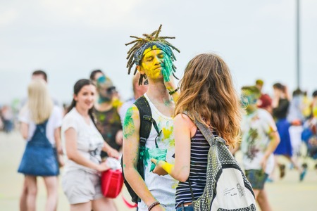 Khabarovsk, Russia - June 25, 2016: Tourist with students celebrating Holi on 25 July 2016 in Khabarovsk, Russia. Holi is a spring festival celebrated as a festival of colors.のeditorial素材