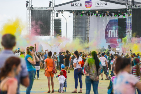 Khabarovsk, Russia - June 25, 2016: Tourist with students celebrating Holi on 25 July 2016 in Khabarovsk, Russia. Holi is a spring festival celebrated as a festival of colors.のeditorial素材