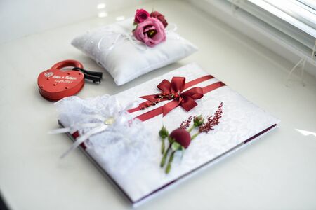 wedding rings in a basket for ringsの写真素材