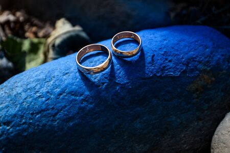 wedding rings in a basket for ringsの写真素材