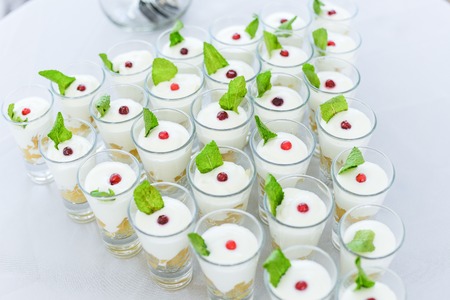 Wedding cake with red roses wedding cakeの写真素材