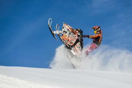 SAKHALIN RUSSIAN - JANUARY 23 : Oleg Bibikov moving snowmobile in winter forest in the mountains of Sakhalin Island in Sakhalin sprint 2015のeditorial素材