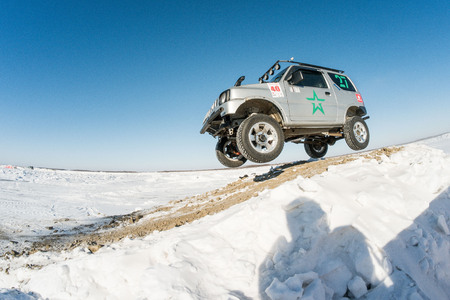 Khabarovsk, Russia - January 30: off-road vehicles during the annual competitions in the jeep sprint on ice January 30, 2016 in Khabarovsk , Russia.のeditorial素材