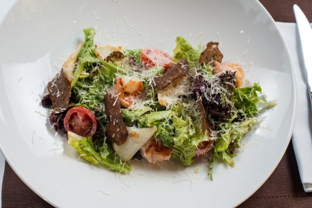 Seafood Caesar Salad with Shrimps, Salad Leaf, Croutons, Cherry Tomato and Parmesan Cheeseの写真素材
