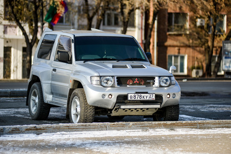 KHABAROVSK RUSSIA - NOVEMBER 4: jeep Mitsubishi Pajero Evolution in silver color is on the street. November 4, 2016 in Khabarovsk, Russiaのeditorial素材