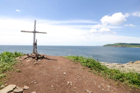 blue sky, high cliffs, the waves of the seaの写真素材