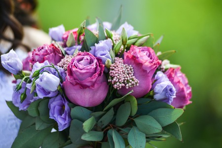 Bridal bouquet with different flowers, honeymoon , redの写真素材