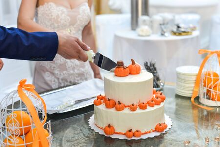 Wedding cake with red roses wedding cake. orangeの写真素材