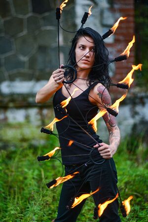 fire show on the shore of the sea