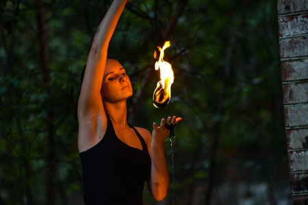 play with fire show on the shore of the sea
