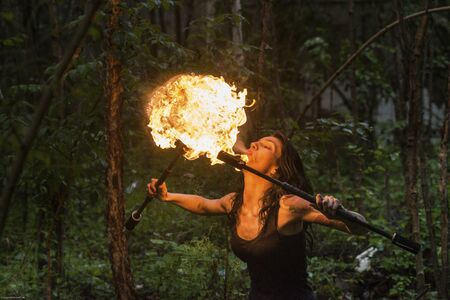 fire show Fire Breather Large Plume Of Flameの写真素材
